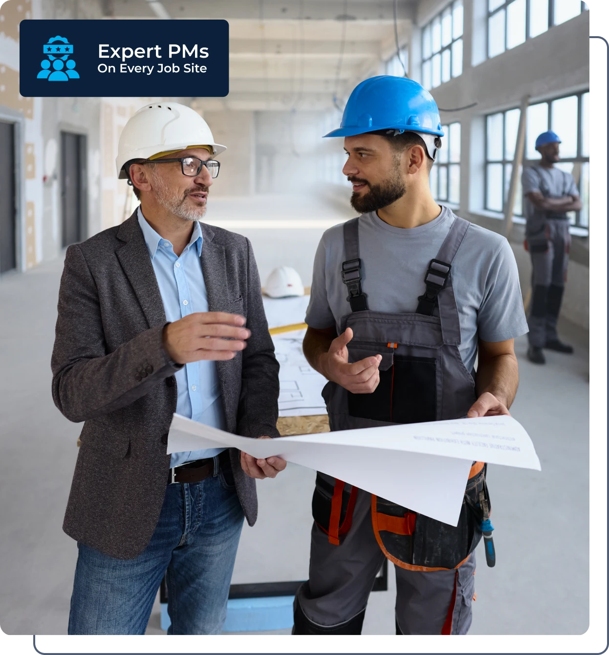 Construction discussion with blueprints