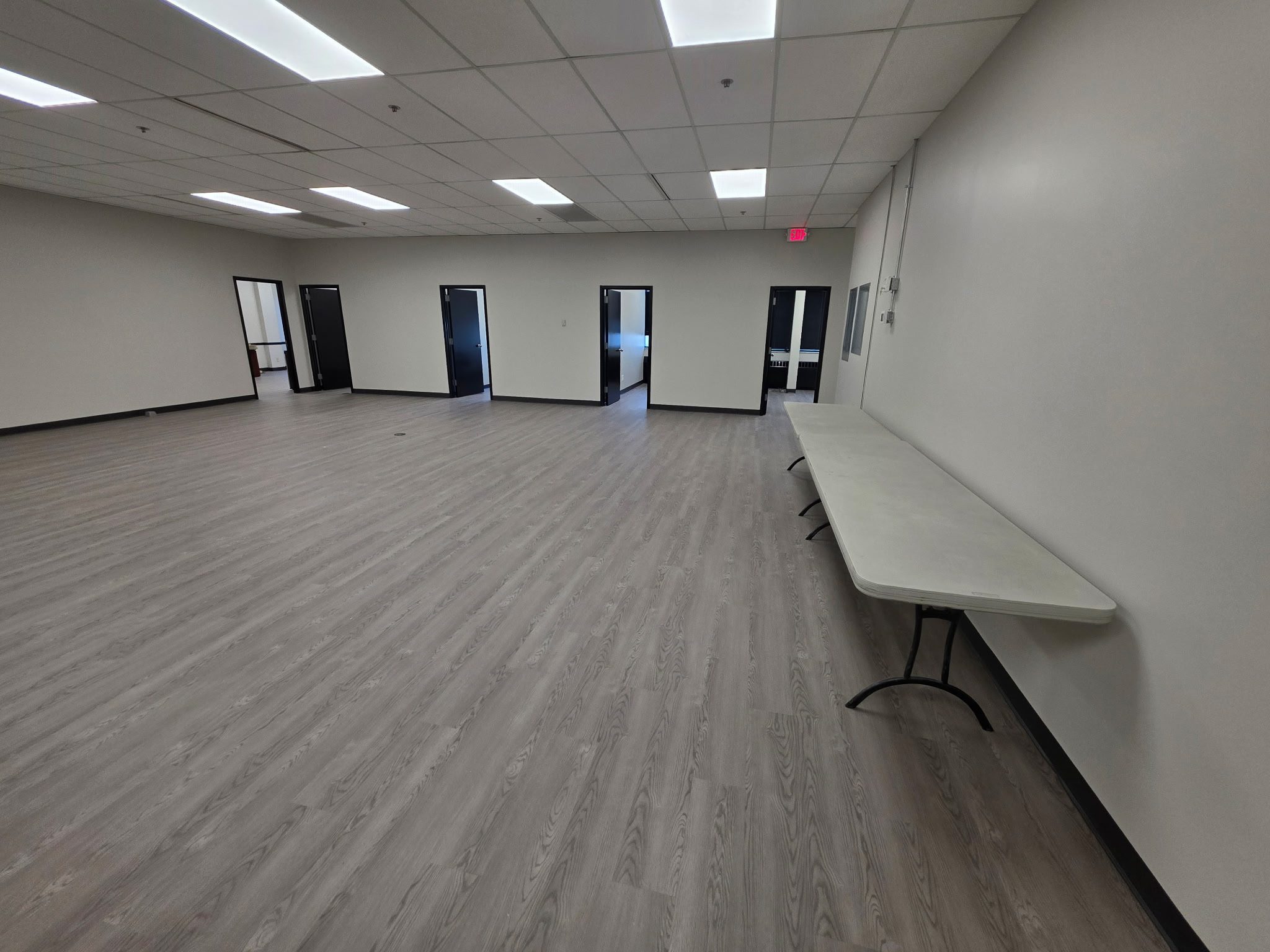 Large room with open doorways.