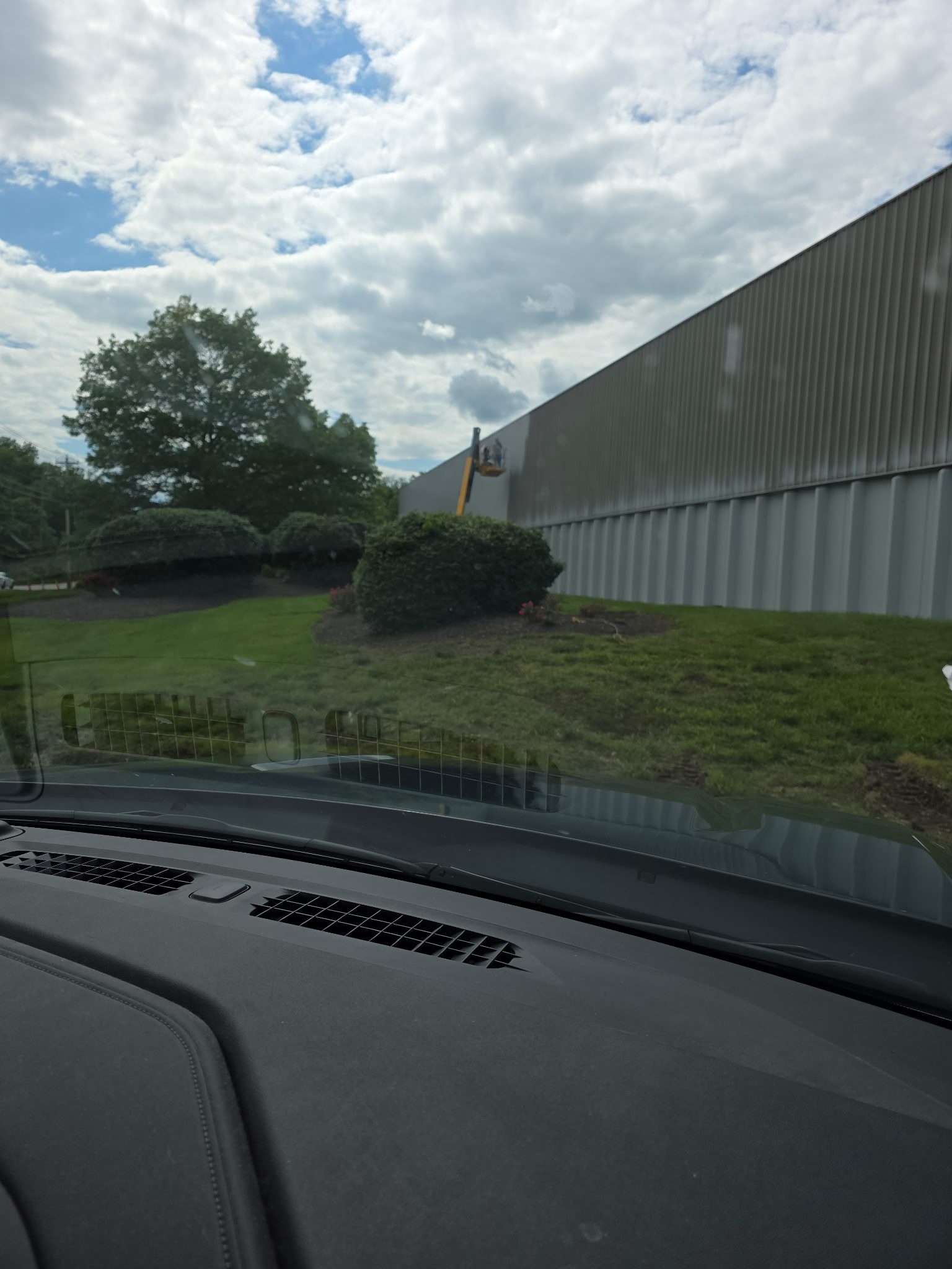 Overcast day near industrial structure and trees